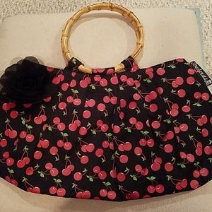 Bamboo handle Sourpuss bag